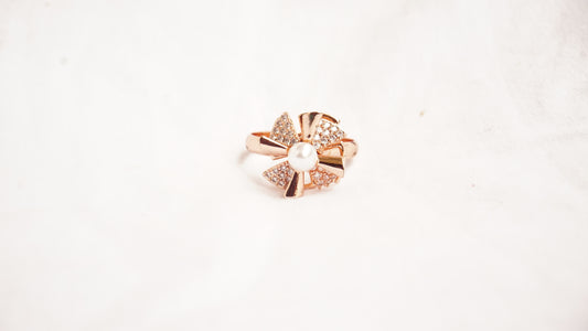 Rose Gold Plated With White Stones And A Pearl
