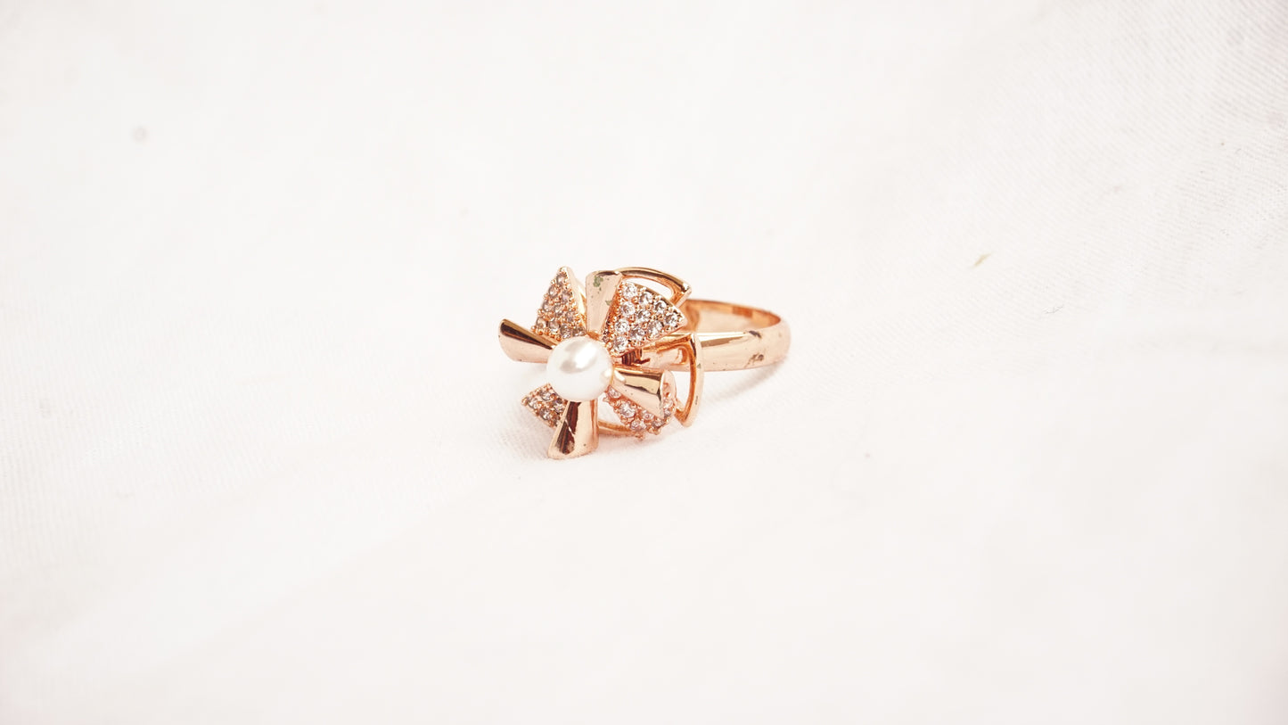 Rose Gold Plated With White Stones And A Pearl