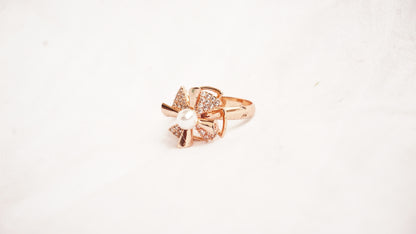 Rose Gold Plated With White Stones And A Pearl