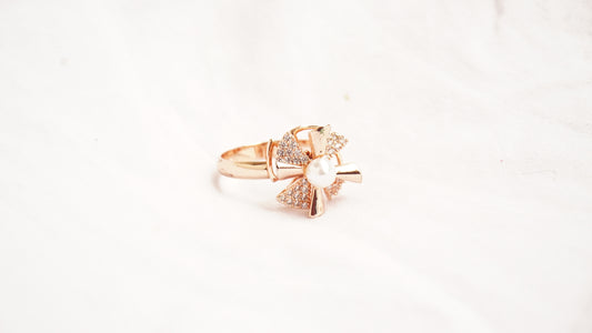 Rose Gold Plated With White Stones And A Pearl