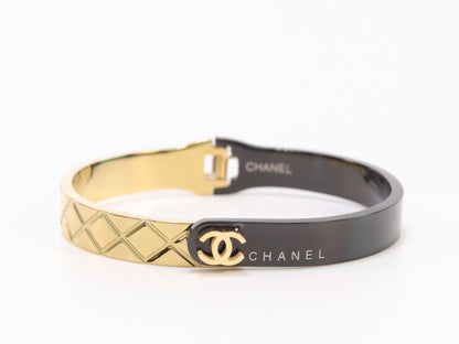 Half n Half gold black cross band style bracelet